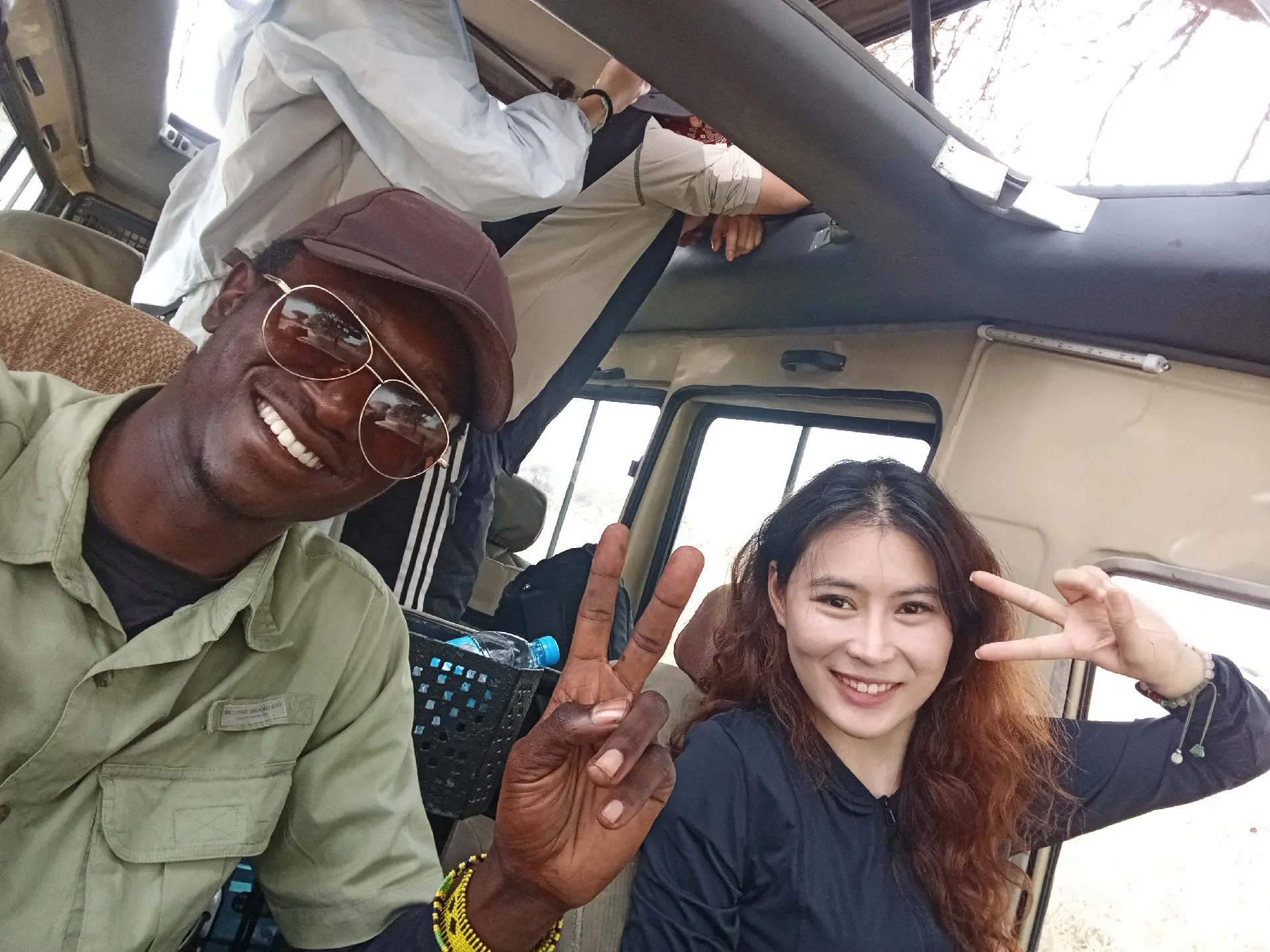 Guide and guest in the safari vehicle